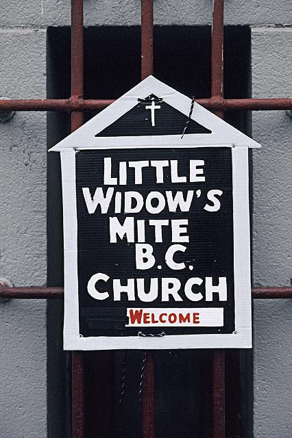 Portable sign to advertise Sunday services, of Little Widow's Mite M. B. Church, placed on the Bronx temple. Seventh Day Adventist Church, where they rent space, Willis Ave. at E. 147th St., Bronx, 2004