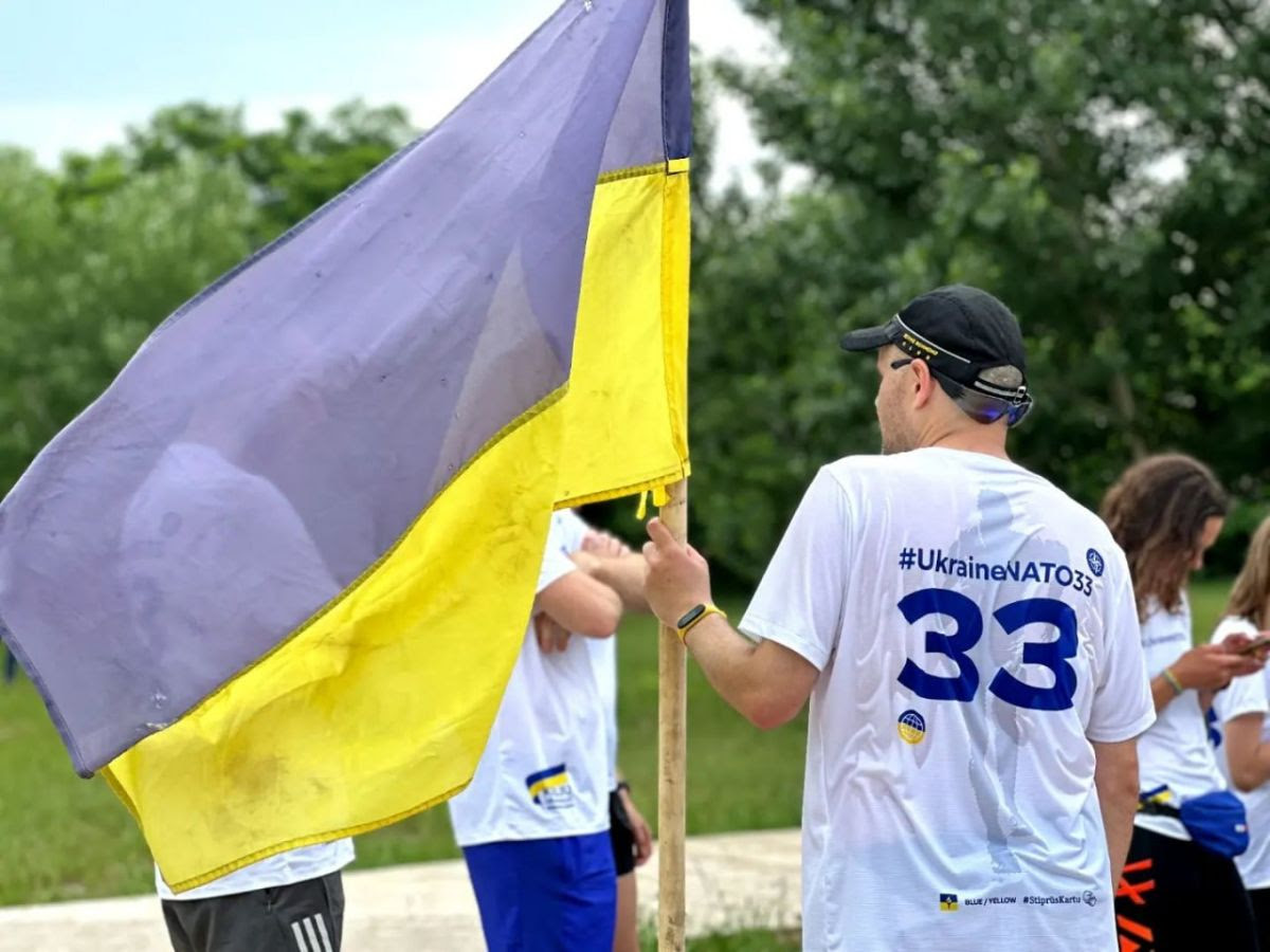 Ukraine supporter wearing a t-shirt emblazoned with the number 33.