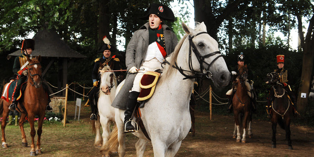 In this June 16, 2007,  file photo, actors play the part of soldiers during a re-enactment of the Battle of Waterloo in Braine-l'Alleud, near Waterloo, Belgi...