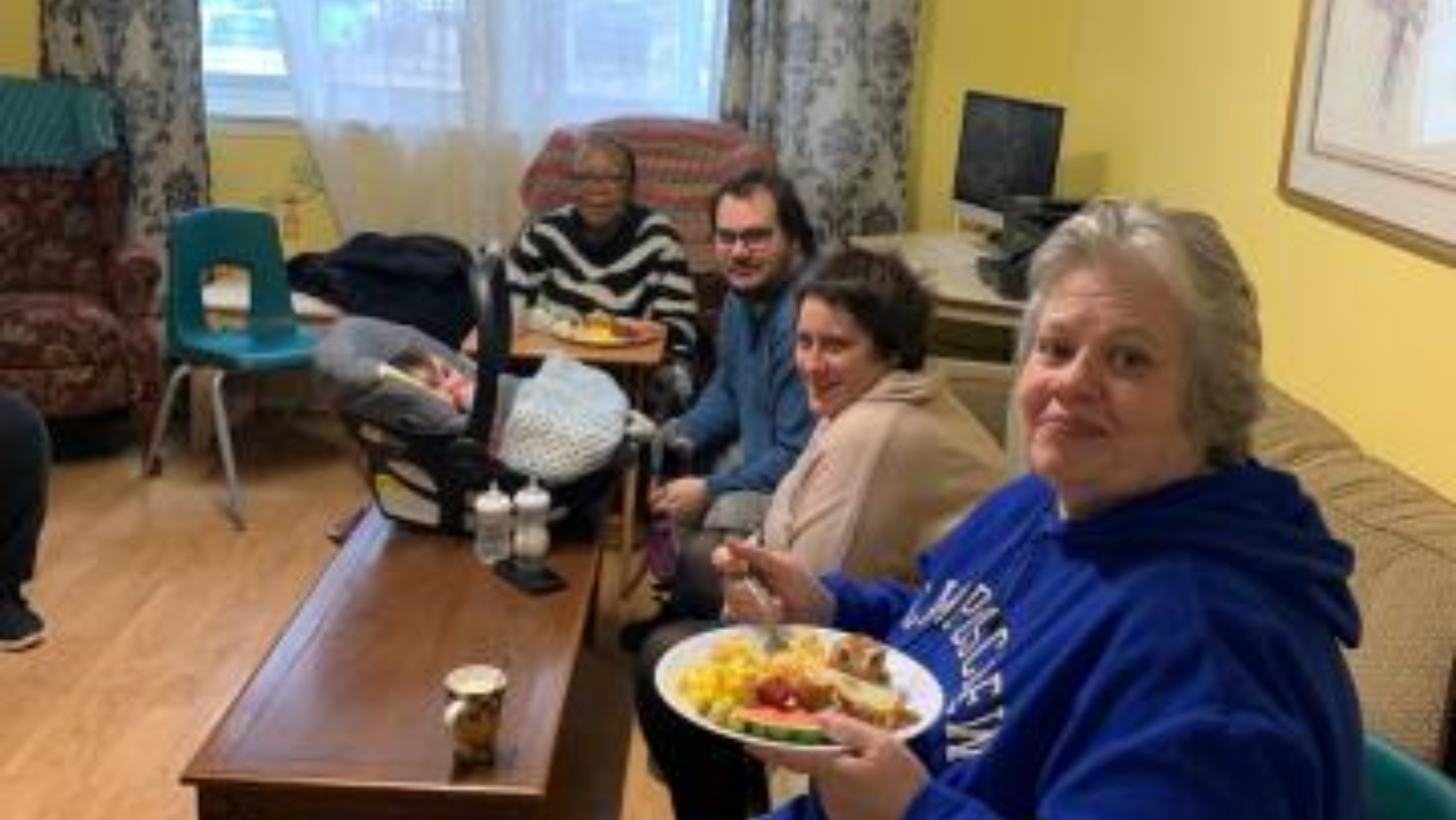 London Community Chaplaincy group eating together