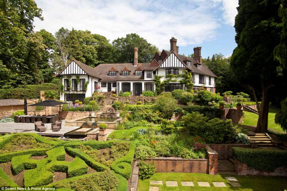 Up for sale: Kenwood, the former home of John Lennon, is on the market for nearly £14million