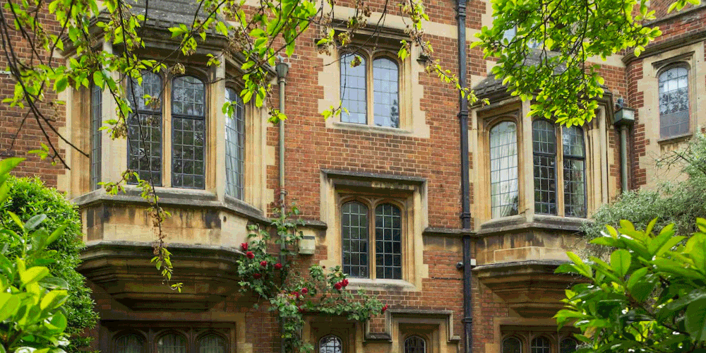 Slideshow animation showing external view of the Oxford Union, interior of the Steward's House living room, and the inside of the Oxford Union Library