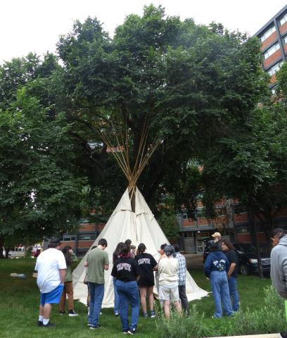 Youth participants at the National Indigenous Spiritual Gathering helped raise a teepee that was provided for sharing teachings.