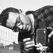 Harold Feinstein with a Rolleiflex camera in Brooklyn in 1947.