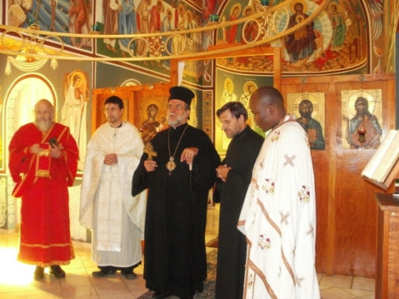 The clergy with Archbishop Damaskinos after the Divine Liturgy in St Demetrius Church. Deacon Stephen nHayes, Fr Elias Palmos, Archbishop Damaskinos, Fr George Cocotos, Archimandrite Athanasius Akunda