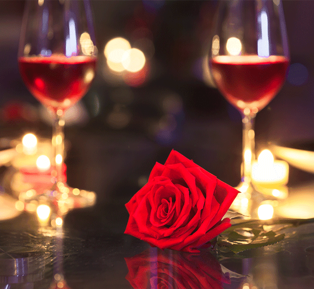 _two wine glasses with rose