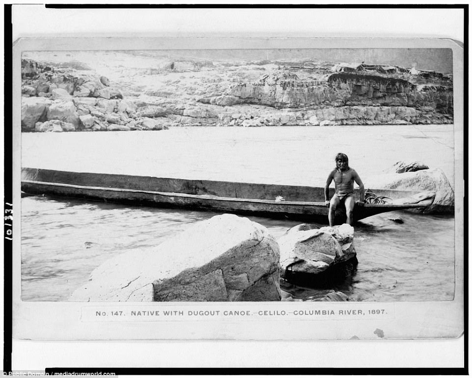 A Wascoe Indian sits on a canoe he has fashioned, 1897. The tribe are from the Columbia River area of Oregon