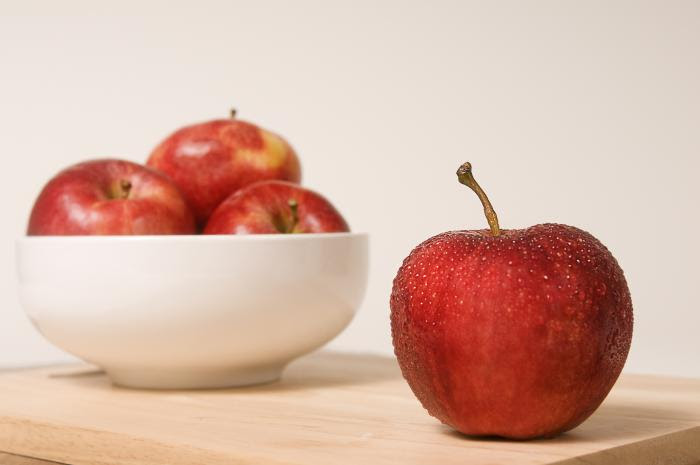 Apple on cutting board