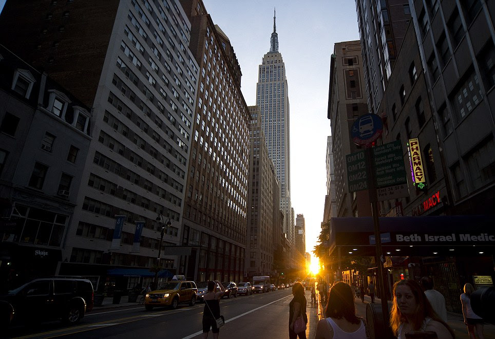 Last year: The sun illuminates New York's 34th Street as well as the city's iconic Empire State Building 