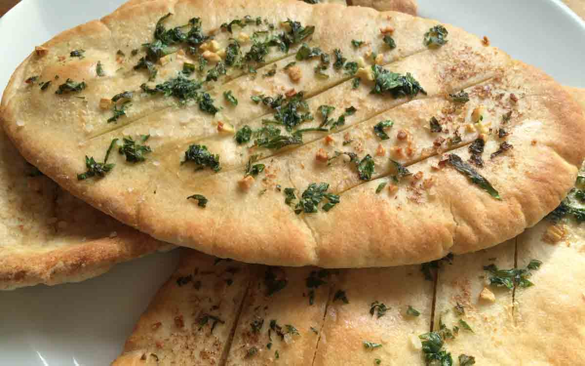 It can be opened up to form a pocket which can be stuffed with a variety of fillings. Quick And Easy Garlic Pitta Bread Pikalily Food Blog