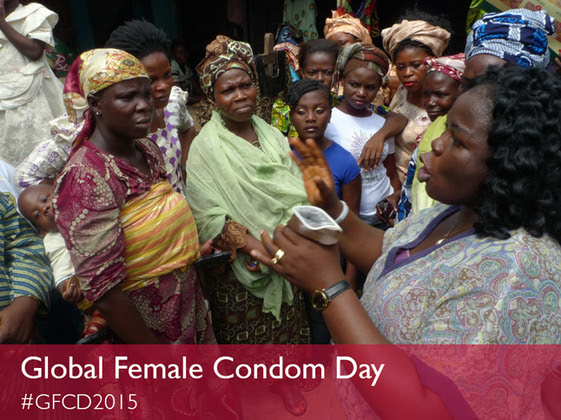 Woman demonstrating use of female condom