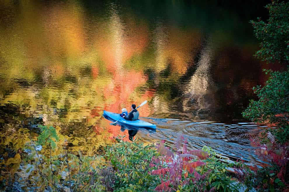 Canoeing on Hampton Lake, North Carolina, is a great way to see fall foliage