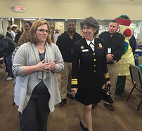 Dr. Lurie and Jori July from the Genesee County Health Department tour a where people can go to get their blood lead levels checked. 