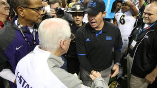 Jim Mora, Bill Snyder share tense handshake after UCLA's Alamo Bowl win