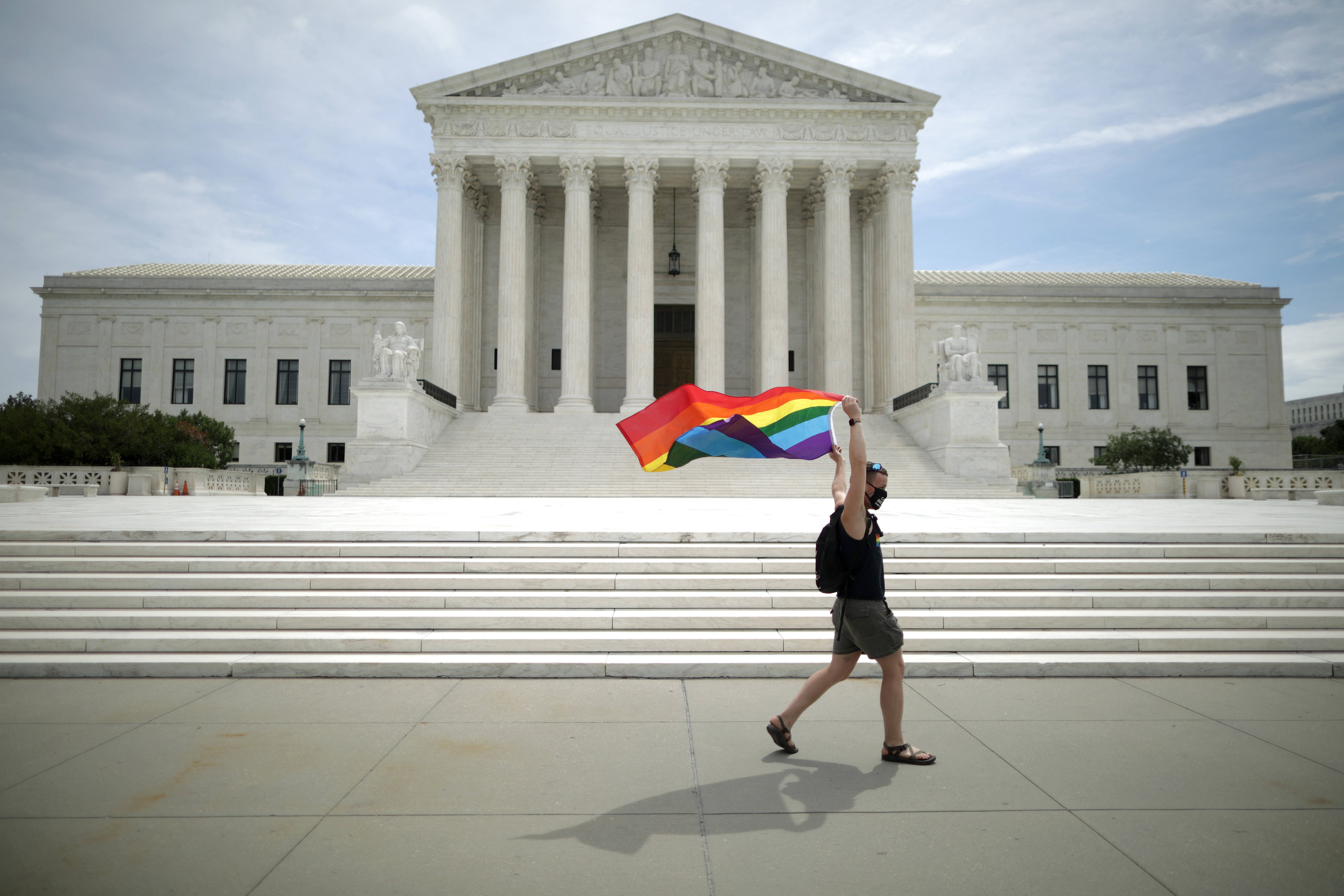 Joseph Fons walks back and forth in front of the U.S. Supreme Court on Monday after the court ruled to prevent LGBTQ employees from getting fired for their orientation or gender identity. (Chip Somodevilla/Getty Images)