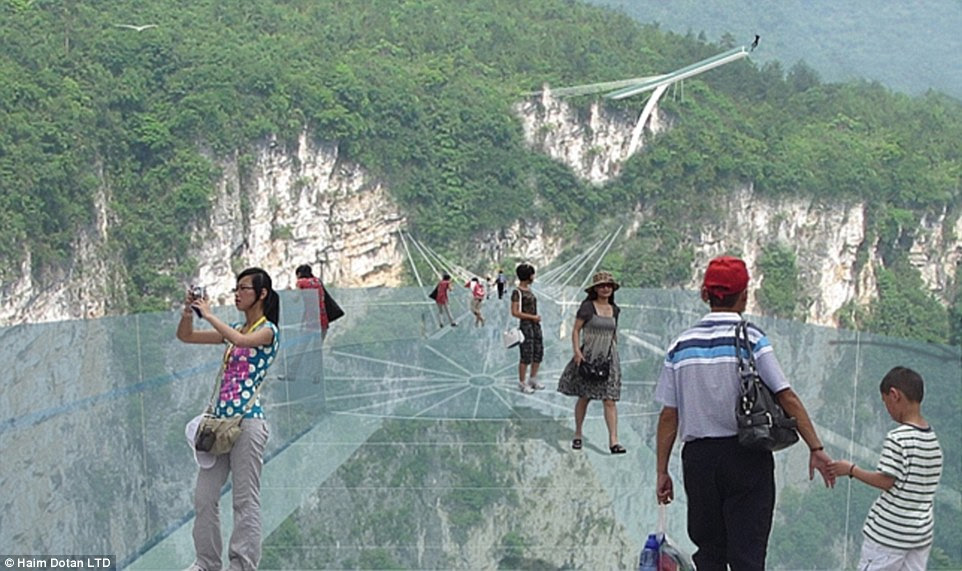 The terrifying platform is no quick stroll,                                                        stretching a                                                        whopping 1410ft                                                        above the                                                        impressive Hunan                                                        province                                                        scenery