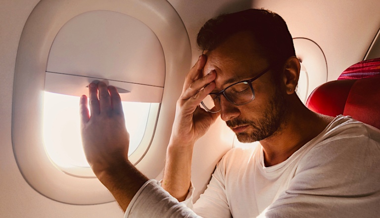 8 Mistakes You’re Making That Are Stopping You From Sleeping on a Plane