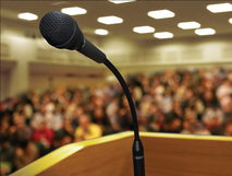 microphone podium in front of auditorium