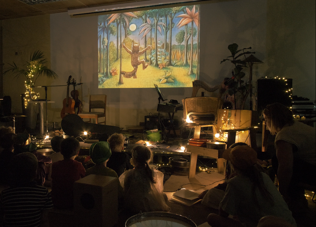 Children enjoying a screening of Where the Wild Things are