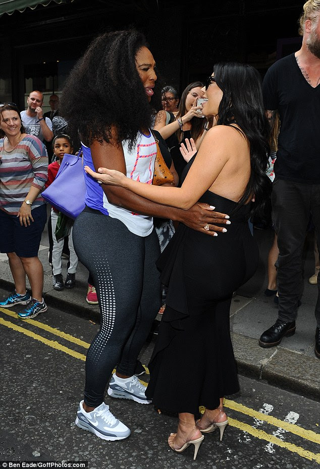 Sporty look: Serena wore a white and purple Nike tank and dark grey leggings