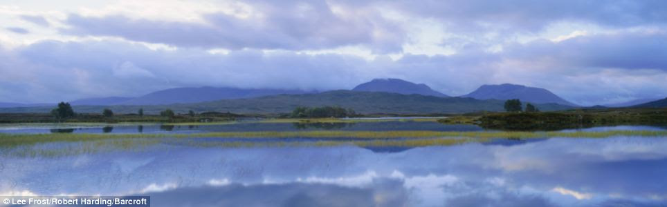 Awe-inspiring view: Loch Ba' rises up in the distance behind the rolling clouds over Rannoch Moor