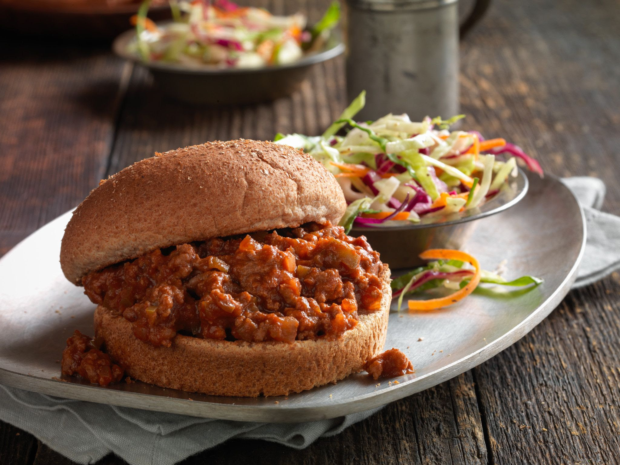 In a medium skillet over medium heat, brown the ground beef, onion, and green pepper; Classic Beef Sloppy Joes