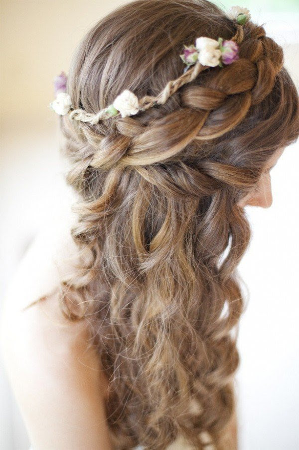 Asymmetric loose side bun wedding hairstyles are not that common, which makes this option a great choice for an original bride. Romantic Braided Wedding Hairstyles With Beautiful Flowers Pretty Designs