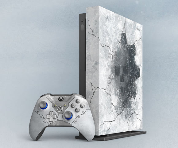 The Gears 5 Xbox One X LE custom console next to an Xbox One controller.