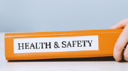 A binder labeled ‘Health and Safety’ 