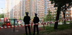 RUSSIA, MOSCOW - MAY 30, 2023: Police officers are seen by an apartment block in southwestern Moscow hit by a drone. The building is being evacuated, no injuries have been reported. Alexander Shcherbak/TASS/Sipa USA/46602411/AK/2305300754