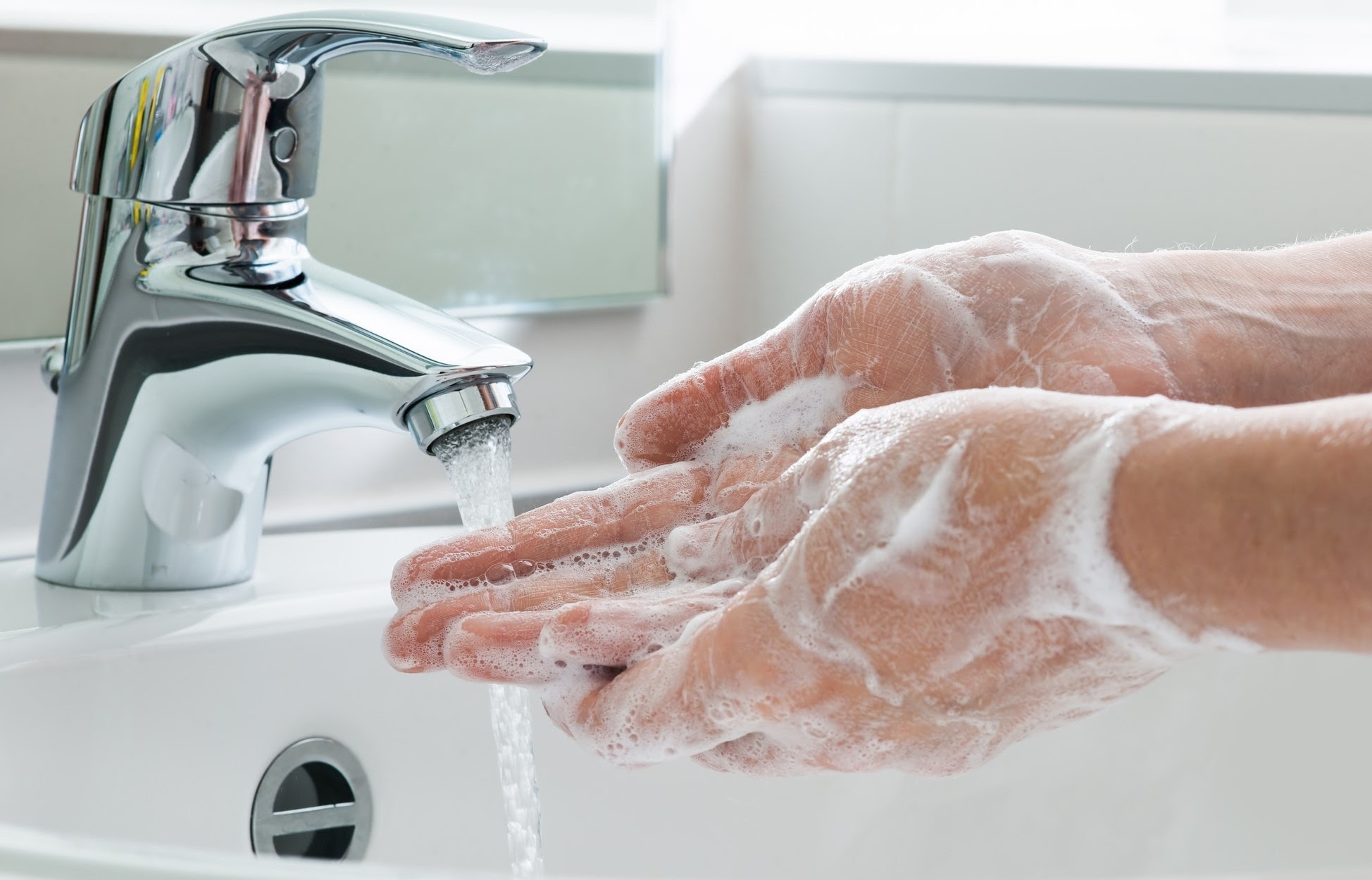 person washing hands