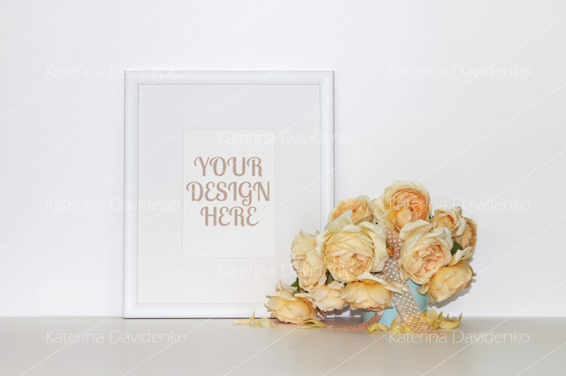 Download Free Picture frame mockup with a bouquet of yellow roses ...