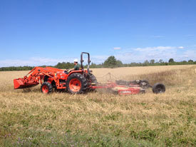 Field work being done on a tractor