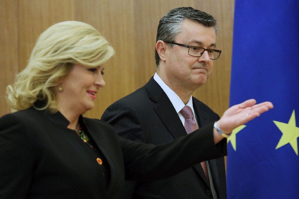 Kolinda Grabar-Kitarovic and Tihomir Oreskovic AFP photo 