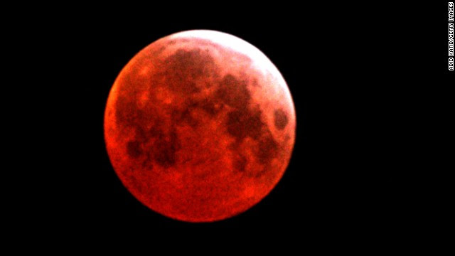 On Tuesday, April 15, there will be a total lunar eclipse that will turn the moon a coppery red, NASA says. It's called a blood moon, and it's one of four total eclipses that will take place in North America within the next year and a half. Pictured here is a blood moon seen over Gaza City in March 2007.