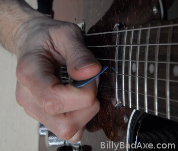 How do you hold a guitar pick? How To Play Guitar Faster Right Hand Picking Technique Explained Guitars Playing Better Reviews