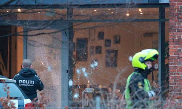  Police outside the Krudttønden cafe in Copenhagen after gunshots were fired during a meeting attended by Swedish cartoonist Lars Vilks. Photograph: Scanpix Denmark/Reuters