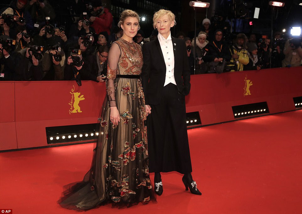 Centre stage: Tilda Swinton also posed for photos with Greta at the star-studded event 