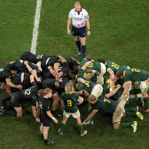 English referee Wayne Barnes (TOP) looks on as a scrum takes place during the France 2023 Rugby World Cup Final between New Zealand and South Africa at the Stade de France in Saint-Denis, on the outskirts of Paris, on October 28, 2023. (Photo by Antonin THUILLIER / AFP)