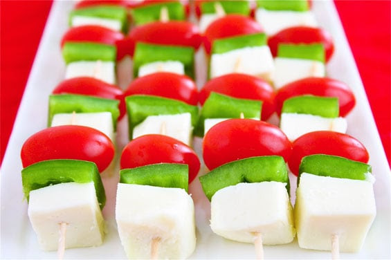 Cut up some fresh cucumbers (or zucchini) and top with cream cheese and a piece of red pepper: Christmas Mini Skewers Veggies Cheese Recipe Gimme Some Oven
