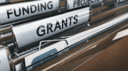 A collection of files labeled ‘funding’ and ‘grants.’