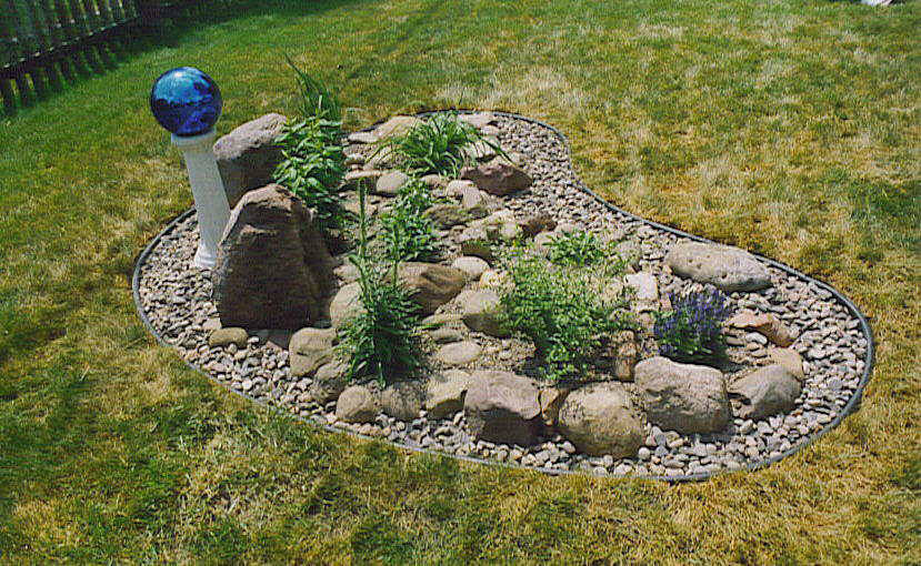 Use rocks to transform your plain and boring backyard into a beautiful and relaxing oasis. Rock Garden Designs