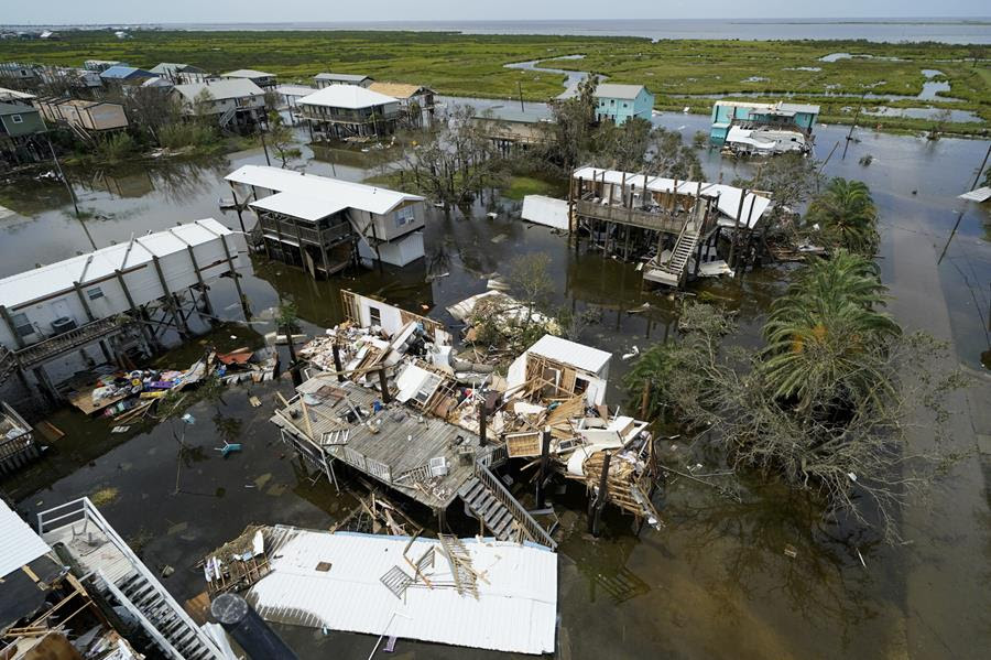 The remains of destroyed homes and businesses are seen in the aftermath of Hurricane Ida in Grand Isle, Louisiana, Aug. 31, 2021. (AP Photo/Gerald Herbert)