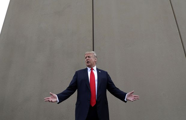 FILE - In this March 13, 2018 file photo, President Donald Trump speaks during a tour as he reviews border wall prototypes in San Diego. Trump slammed California Gov. Jerry Brown&#39;s posture on sending National Guard troops to the Mexican border Tuesday, April 17, 2018, even as Brown said he was nearing agreement on joining the president&#39;s mission and that his troops were &amp;quot;chomping at the bit ready to go.&amp;quot; (AP Photo/Evan Vucci, File)