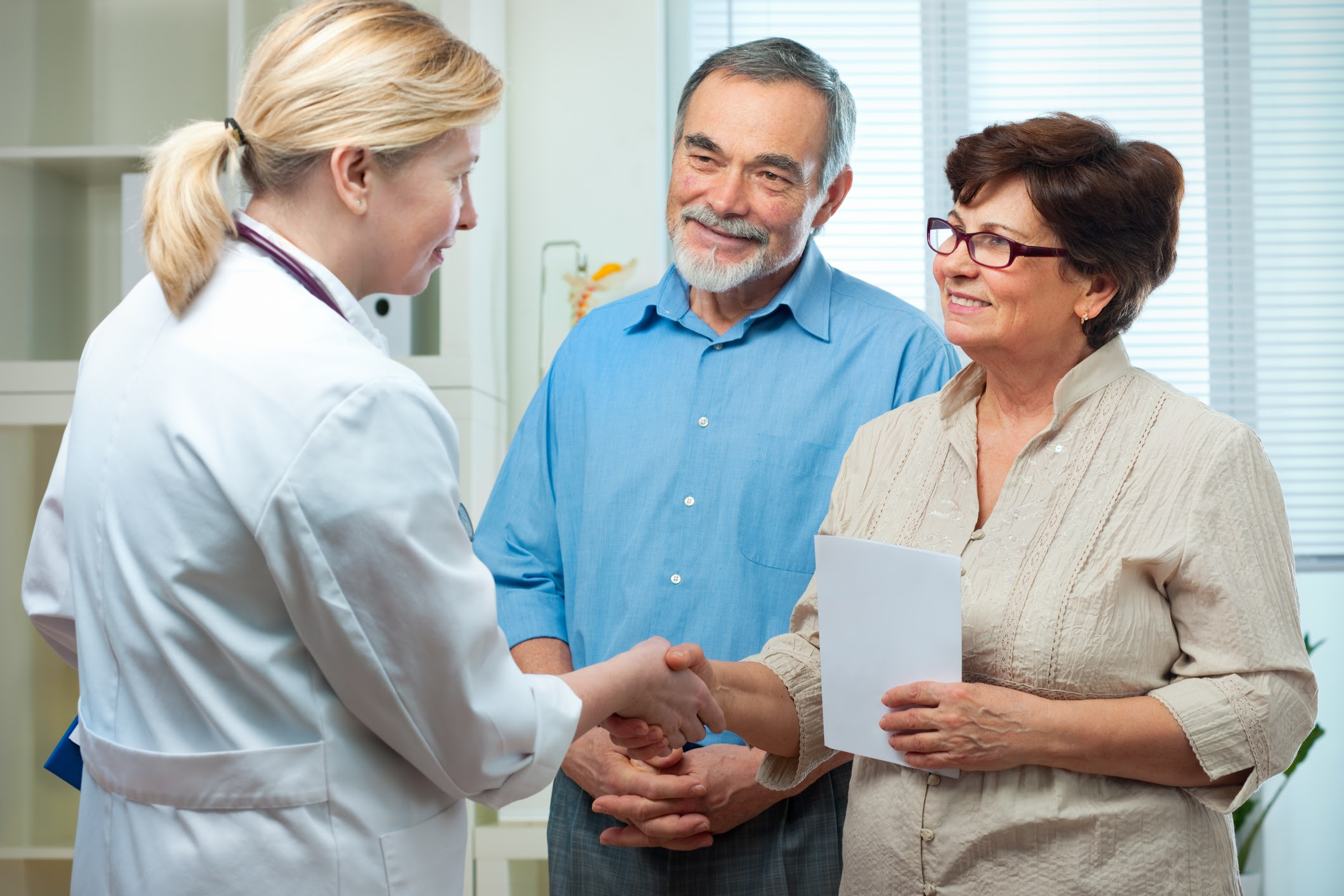 Man and woman meeting with the doctor