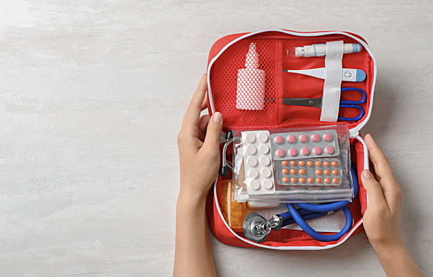 An emergency kit filled with medical supplies.