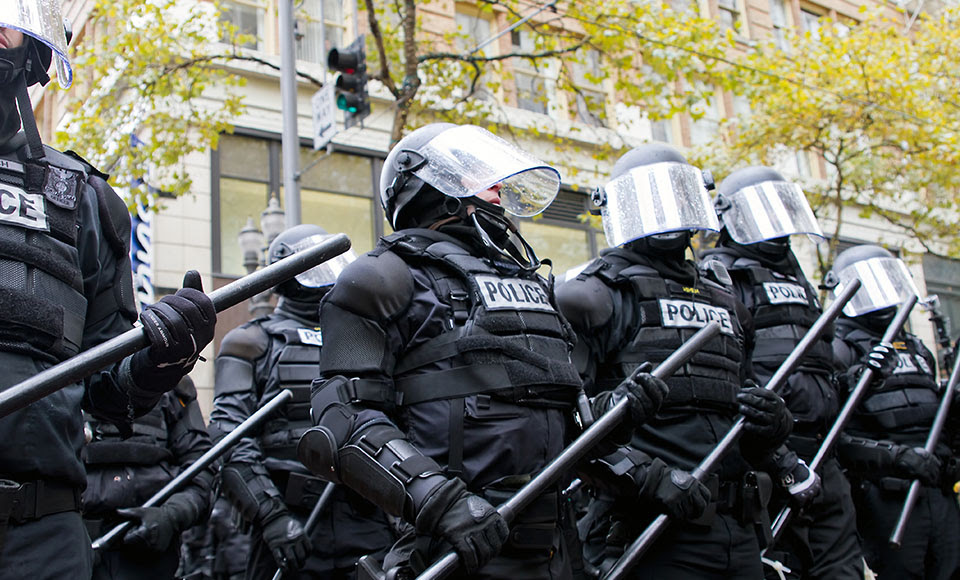 Police in Riot Gear Holding the Line in Downtown Portland, Oregon during a Occupy Portland protest