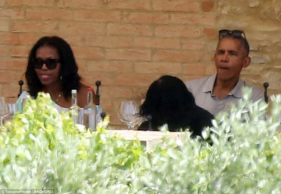 Living it up: Barack Obama and his wife Michelle enjoyed lunch on Monday at Borgo Finocchieto, the stunning Tuscan villa where they are staying during their trip to Siena, Italy 