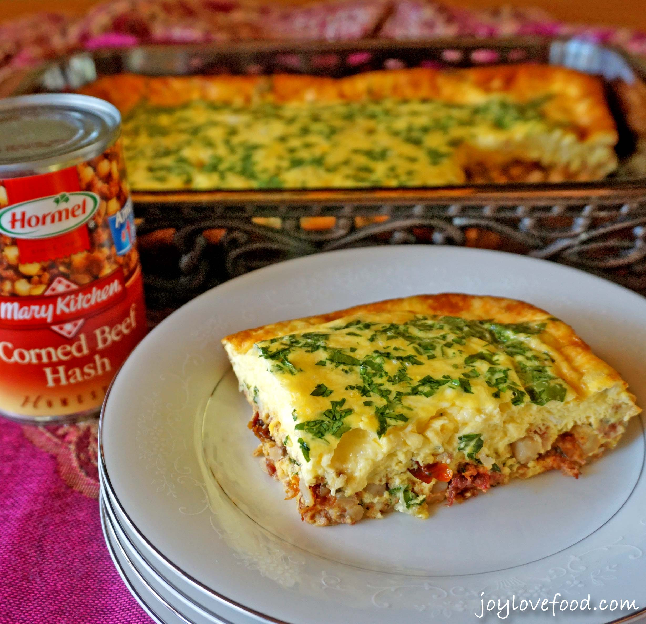 Canned corned beef is combined with macaroni, cheese, cream of chicken soup, and vegetables. Corned Beef Hash And Egg Casserole With Sun Dried Tomatoes And Swiss Cheese Joy Love Food