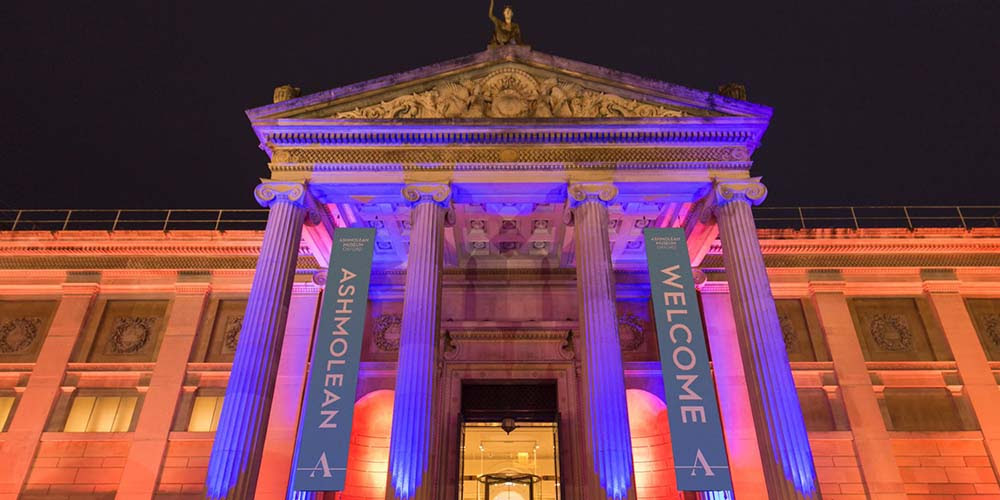 A photography of the Ashmolean Museum at night